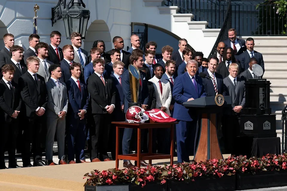 U.S. President Donald Trump speaks next to head football coach at Indiana University, Curt Cignetti, as he hosts the 2026 College Football Playoff (CFP) National Champions from Indiana University at the White House in Washington, D.C., U.S., May 11, 2026. REUTERS/Kylie Cooper